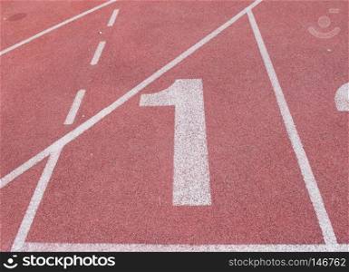 ""1" Numbers on red running track"
