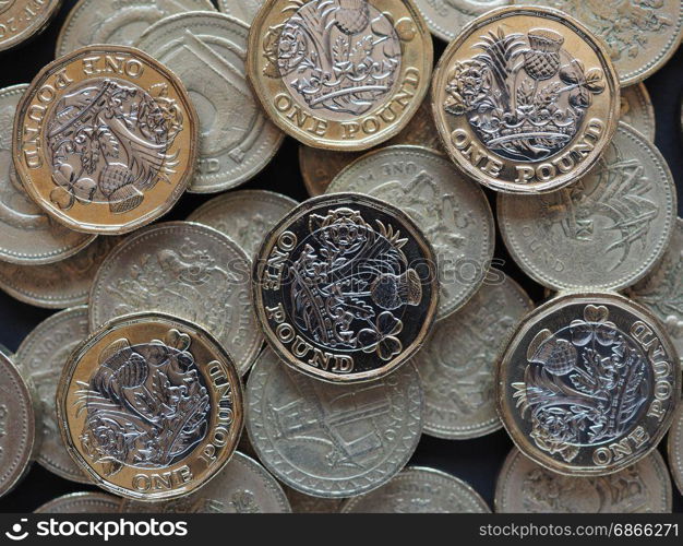 1 pound coin, United Kingdom. new and old 1 pound coin money (GBP), currency of United Kingdom