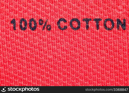 100% cotton - picture label on clothes. Close-up.