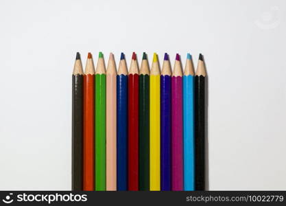 12 PCs colored coloring pens standing side by side