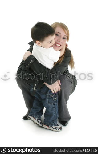 14 year old girl and 2 year old boy hugging.