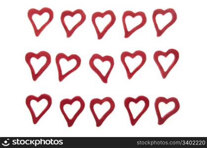 15 ornamental hearts on white background made from felt.