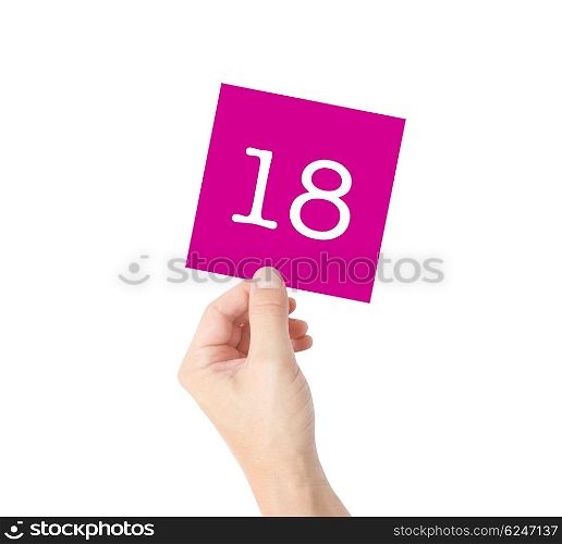 18 written on a card held by a hand