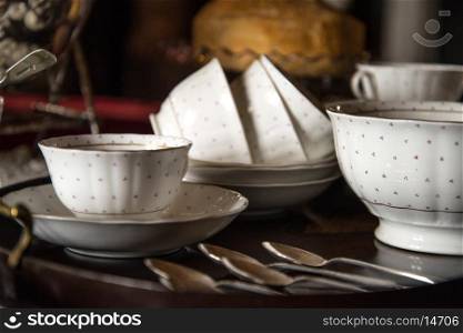 18th Century cups and saucers on inlaid wooden serving tray