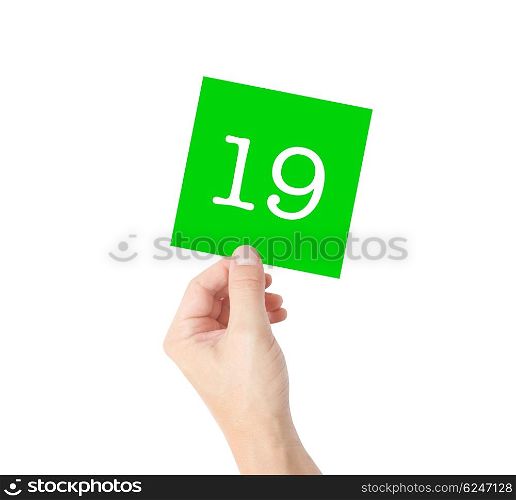 19 written on a card held by a hand