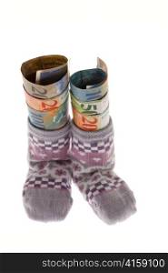 2 children socks with swiss francs banknotes