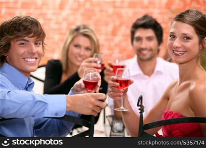 2 couples enjoying meal