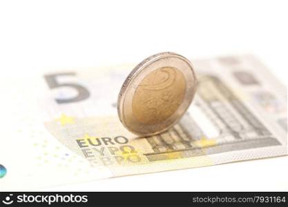 2 euro coins on banknotes