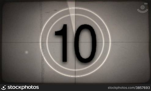 2 versions of an old-fashioned film countdown leader (color and desaturated sepia) with crackling audio.