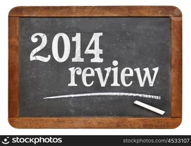 2014 review - year summary concept on a vintage slate blackboard