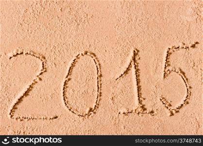 2015 written on the sand beside the sea