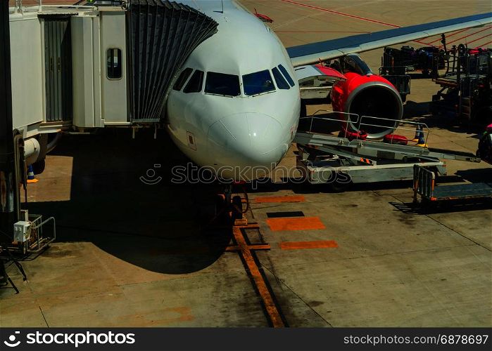 2016: Airport of Mallorca, airplane in departure area during loading and refueling ready for departure.