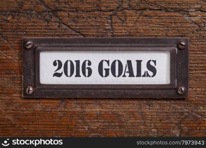 2016 goals - a label on a grunge wooden file cabinet, New Year goals and resolutions concept