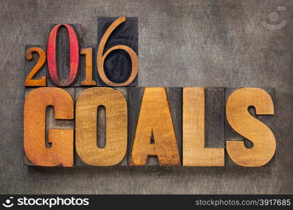 2016 goals - New Year resolution concept - text in vintage letterpress wood type blocks against grunge metal background