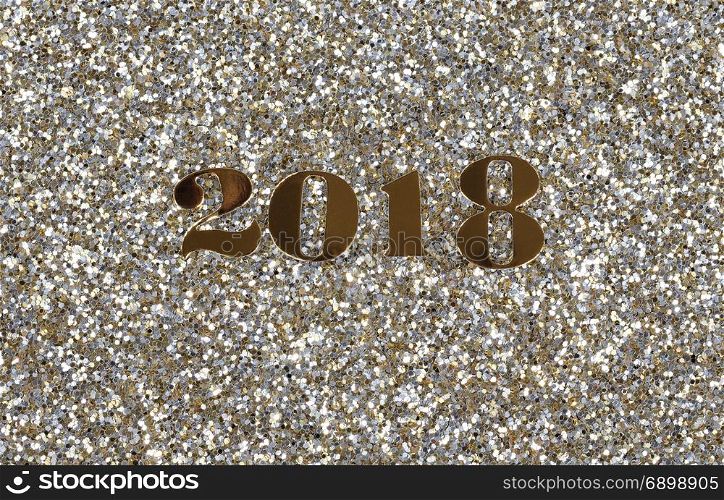 2018 gold New Year numbers on shinny glitter background