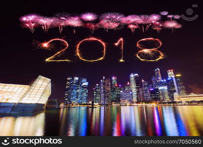 2018 Happy new year firework Sparkle with central business district building of Singapore city at night