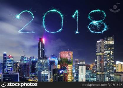 2018 Happy new year firework Sparkle with cityscape view of Singapore city at night