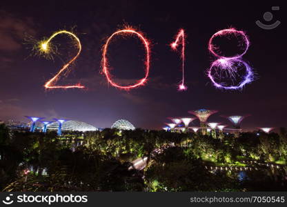 2018 Happy new year firework Sparkle with Gardens by the bay with light at night, Singapore