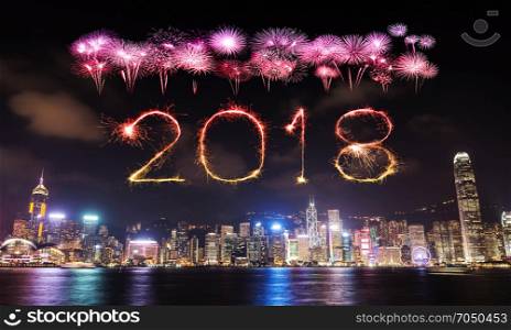 2018 Happy new year firework Sparkle with Hong Kong cityscape at night