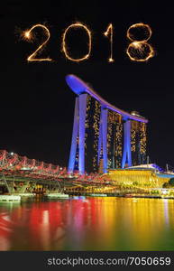 2018 Happy new year firework Sparkle with the Helix Bridge at night, urban landscape of Singapore