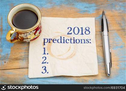 2018 predictions list on a napkin with a cup of coffee