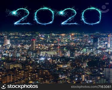 2020 Happy New Year fireworks celebrating over Tokyo cityscape at night, Japan
