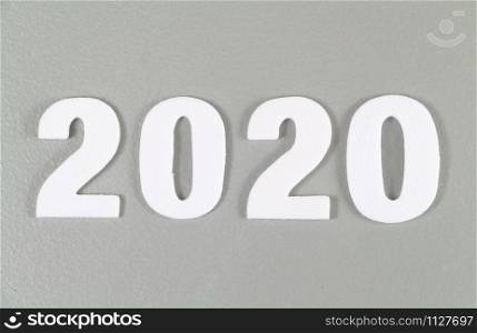 2020 in white figures on gray background
