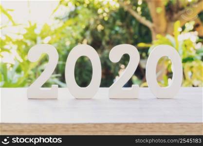 2020 New year concept on Empty wood table with display montage for product.