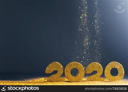 2020 New Year luxury design concept. Golden 2020 New Year horizontal template with golden glitter on blue backgound. 2020 New Year luxury design
