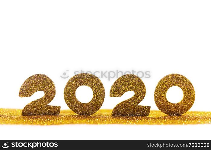 2020 New Year luxury glitter design concept numbers in golden glitters isolated on white background. 2020 New Year glitter design