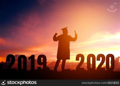 2020 New year Silhouette young man graduation in 2020 years education congratulation concept ,Freedom and Happy new year