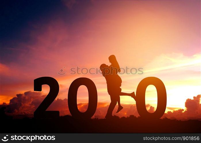 2020 Newyear Silhouette young couple Happy for romantic new year concept.