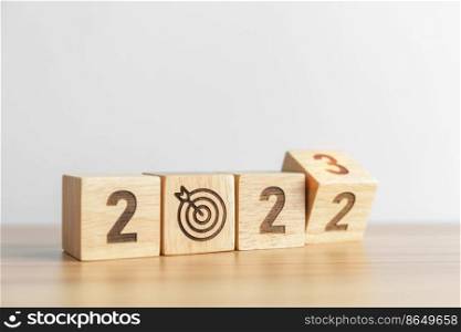 2022 change to 2023 Year block with dartboard icon. Goal, Target, Resolution, strategy, plan, Action, mission, motivation, and New Year start concepts