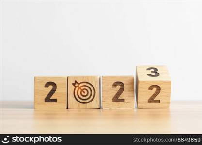 2022 change to 2023 Year block with dartboard icon. Goal, Target, Resolution, strategy, plan, Action, mission, motivation, and New Year start concepts