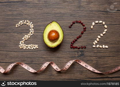 2022 Happy New Year and New You with fruit and vegetable; Avocado, adlay and Bean on table. Goals, Healthy, Motivation, Resolution, Time to New Start, dieting and world food day concept