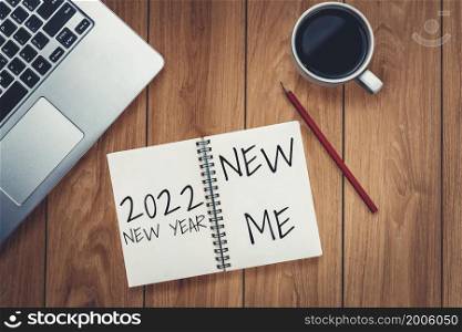 2022 Happy New Year Resolution Goal List and Plans Setting - Business office desk with notebook written about plan listing of new year goals and resolutions setting. Change and determination concept.. 2022 Happy New Year Resolution Goal List and Plans Setting