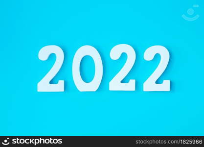 2022 white text number on blue background. Resolution, plan, review, goal, start and New Year holiday concepts