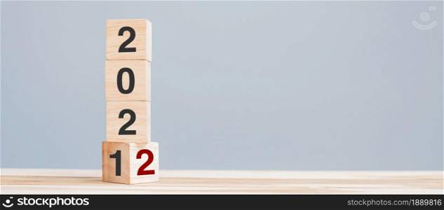 2022 wooden cube blocks on table background. Resolution, plan, review, goal, start and New Year holiday concepts