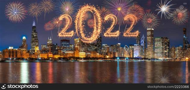 2022 written with Sparkle firework with multicolor of fireworks on Panorama scene of Chicago cityscape river side along Lake Michigan background, USA skyline,Happy new year and merry Christmas concept