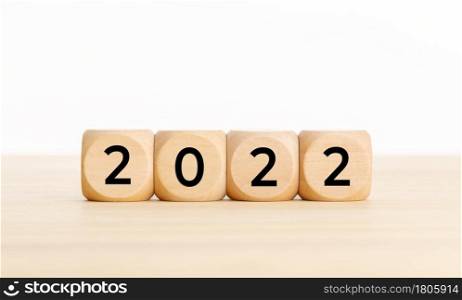 2022 year concept. Wooden Blocks With text on table. Copy space
