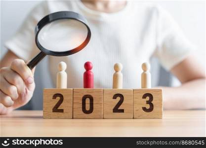 2023 block with magnifying glass and people. hiring, employee, recruitment, job and jobless concept