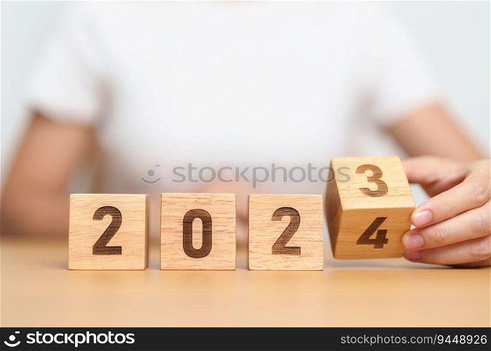 2023 change to 2024 year block on table. goal, Resolution, strategy, plan, start, budget, mission, action, motivation and New Year concepts