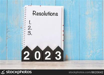 2023 Happy New Year with RESOLUTION word and wooden number. time for a New Start, goal, Plan, Action and Mission Concept