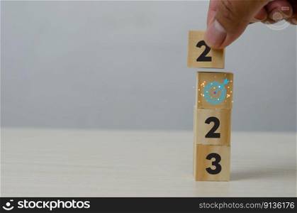 2023 numbers on set of wooden blocks start up concept.