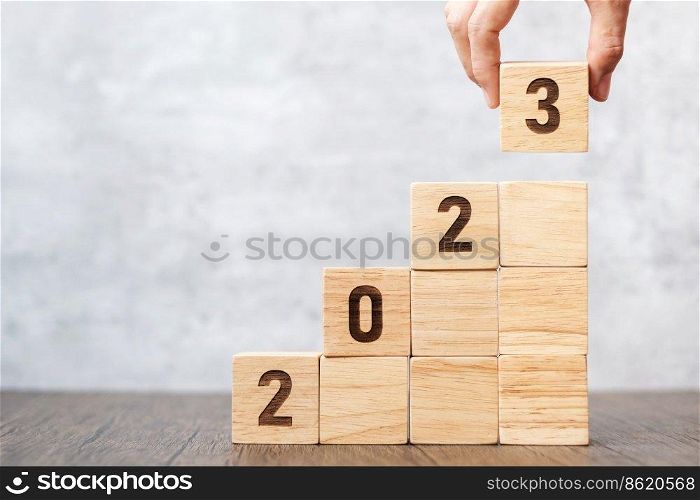 2023 wood block with business goal,  success, strategy, target, mission, action, growth, teamwork, plan, idea and New Year start concept