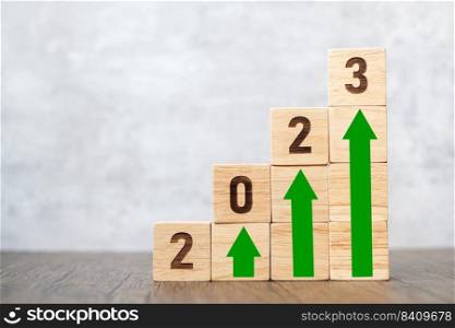 2023 wood block with business growth, success, strategy, target, mission, action, goal, teamwork, plan, idea and New Year start concept