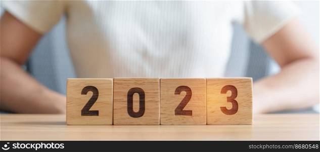 2023 year block on table. goal, Resolution, strategy, plan, start, budget, mission, action, motivation and New Year concepts