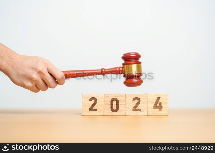 2024 block with judge gavel on table. Law, lawyer, judgment, justice auction and bidding concept