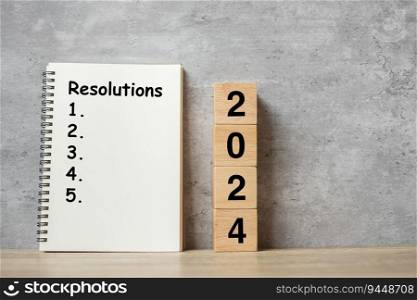 2024 Happy New Year with Resolution notebook and wooden number. countdown, Goals, Plan, Action and Mission Concept