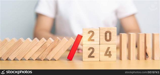2024 year with falling blocks on table, Risk Management, recession, business financial, Resolution, strategy, goal, New Year planning and inflation economy concepts